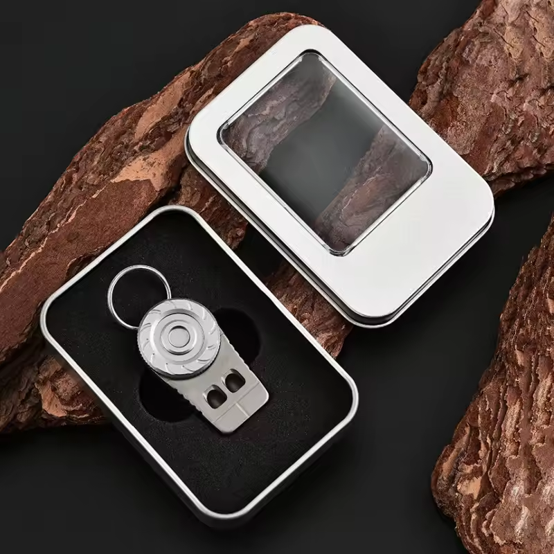 SonicSpinner Titanium Emergency Whistle - 120dB Survival Whistle with Fidget Spinner
