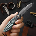 Damascus Folding Knife – Peacock Forge VG10 Pocket with Hand-Carved Handle EDC detail image - detail view 6