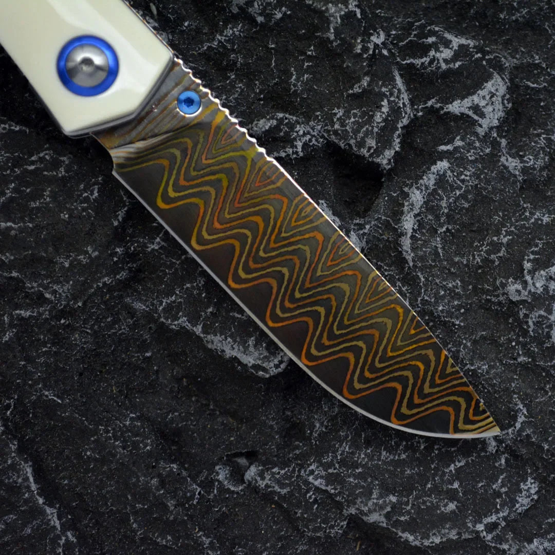 Damascus Folding Knife – Winged Avian with G10 Handle & Zirconium Inlay with 59HRC detail image - detail view 9